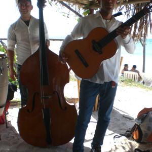 Music whilst you eat BBQ lobster and chill out on a white sand beach in Western Cuba